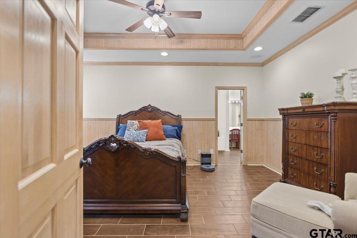 1336 Bridle Path Lane Hideaway, TX 75771 - Photo 42 of 48 a bedroom with a bed and wooden floor