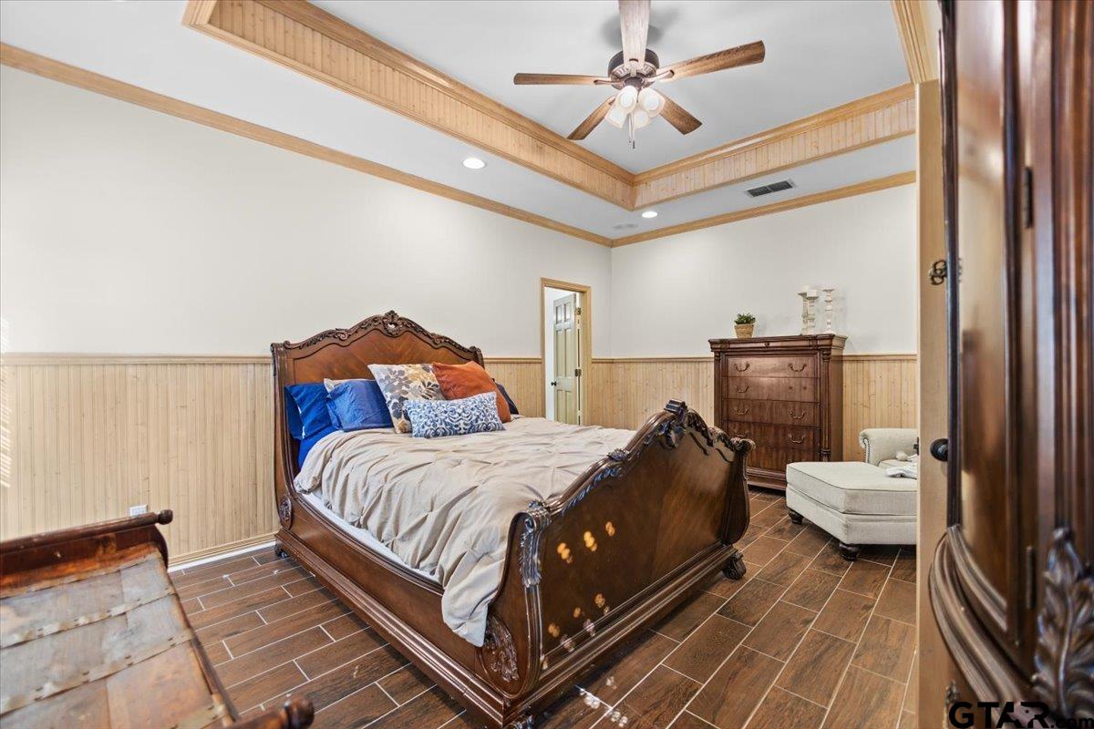 1336 Bridle Path Lane Hideaway, TX 75771 - Photo 43 of 48 a bedroom with a bed and wooden floor