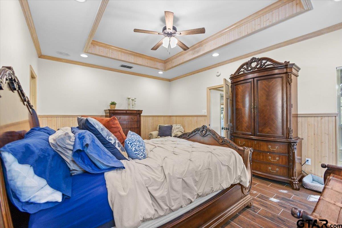 1336 Bridle Path Lane Hideaway, TX 75771 - Photo 45 of 48 a bedroom with bed and wooden floor