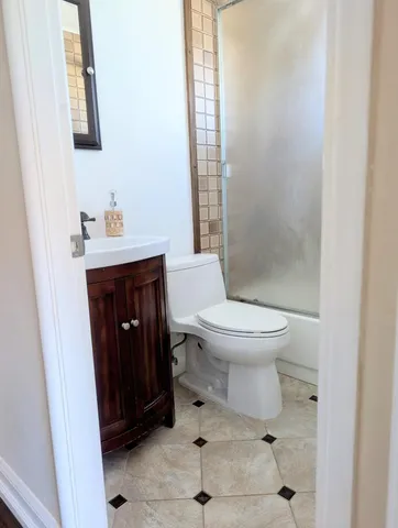 a bathroom with a sink and a toilet