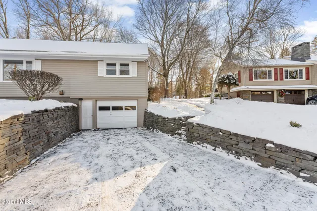 $425,000 | 50 Hillcrest Drive, Sand Lake, NY 12196