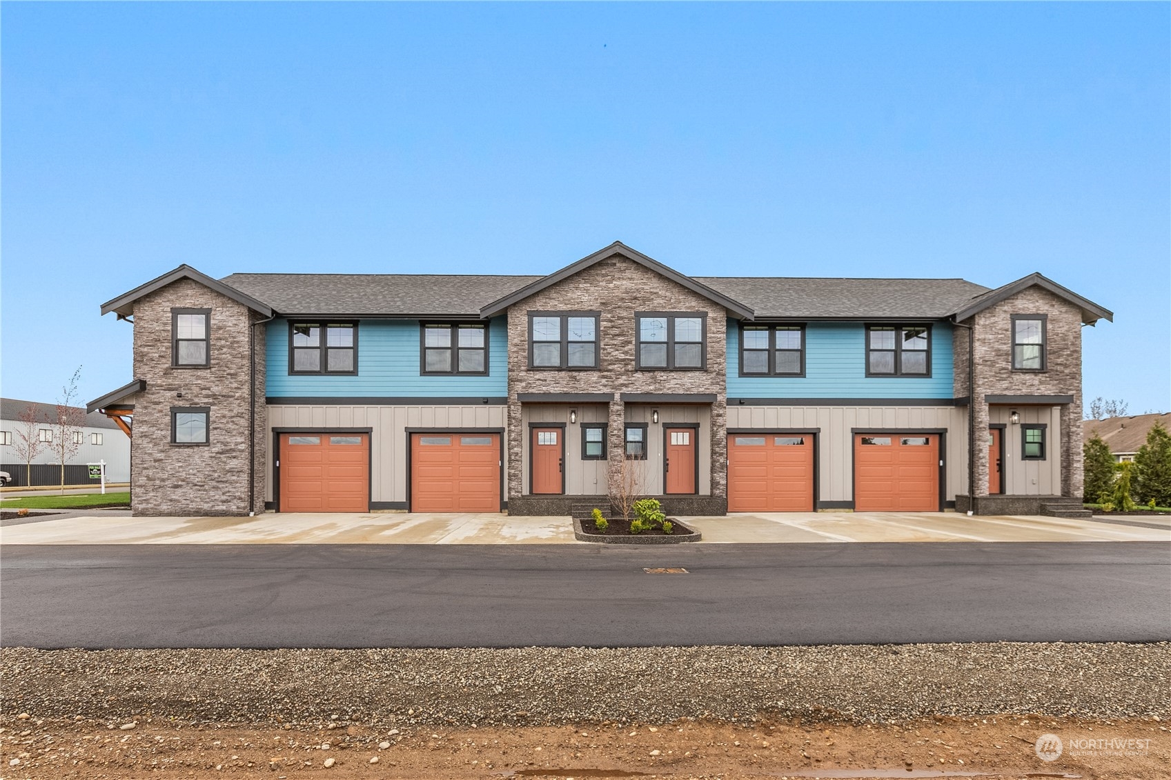 2217 Dejong Drive Lynden, WA 98264 - Photo 1 of 28 a front view of a house with a garden