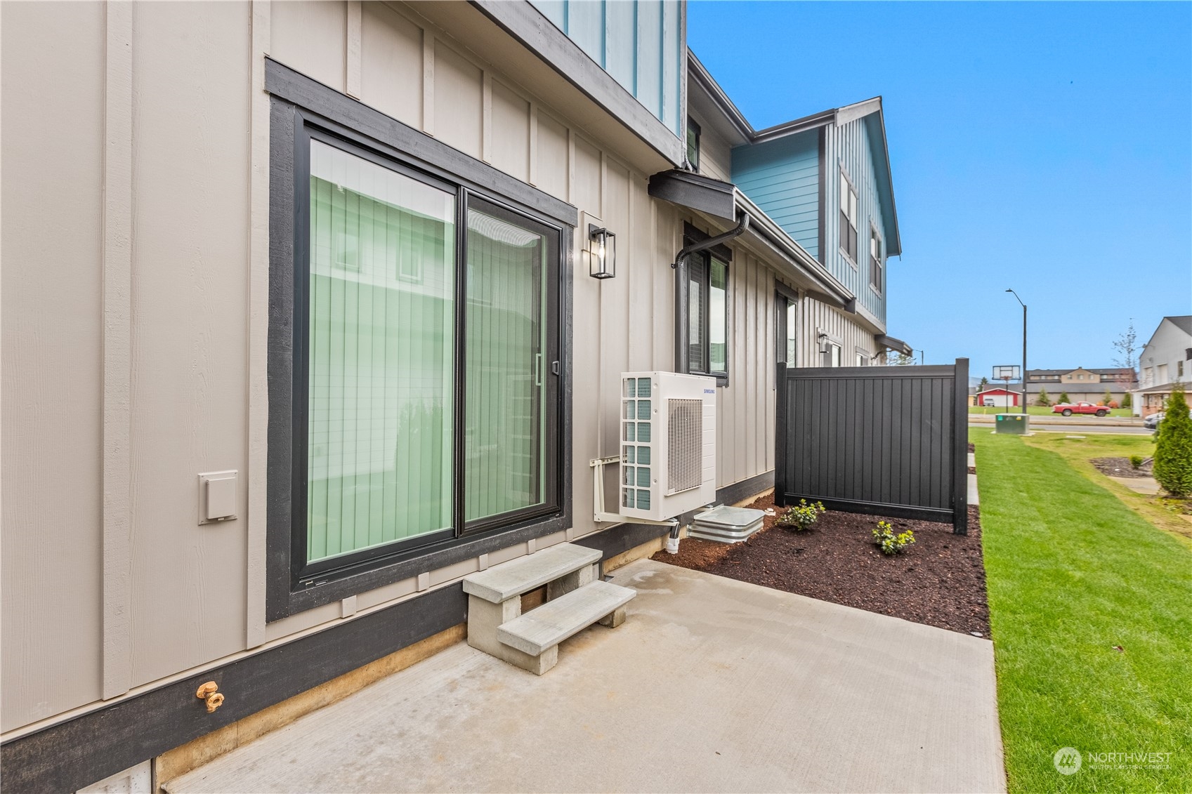 2217 Dejong Drive Lynden, WA 98264 - Photo 11 of 28 a backyard of a house with table and chairs