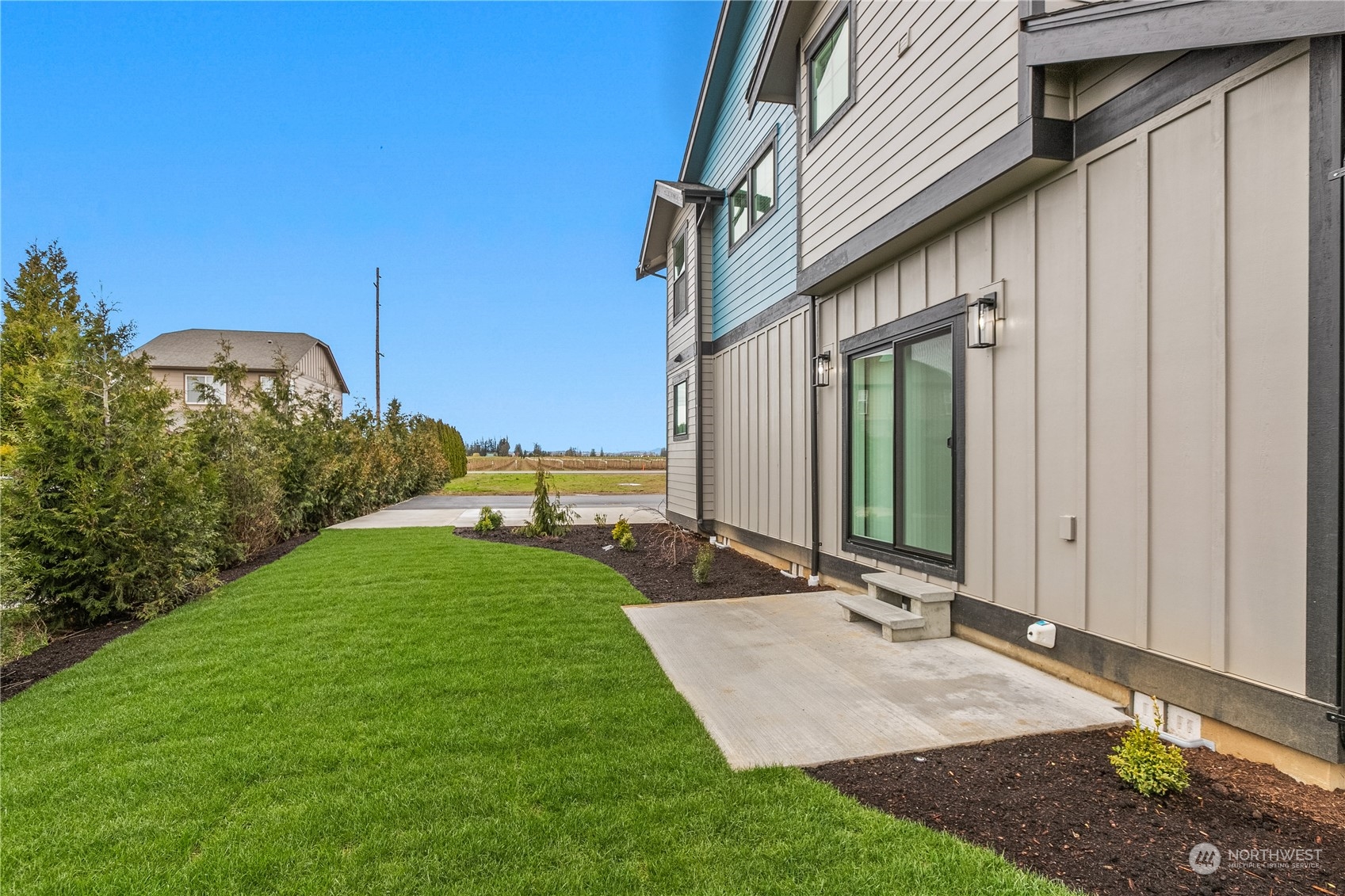 2217 Dejong Drive Lynden, WA 98264 - Photo 12 of 28 a view of a back yard of the house