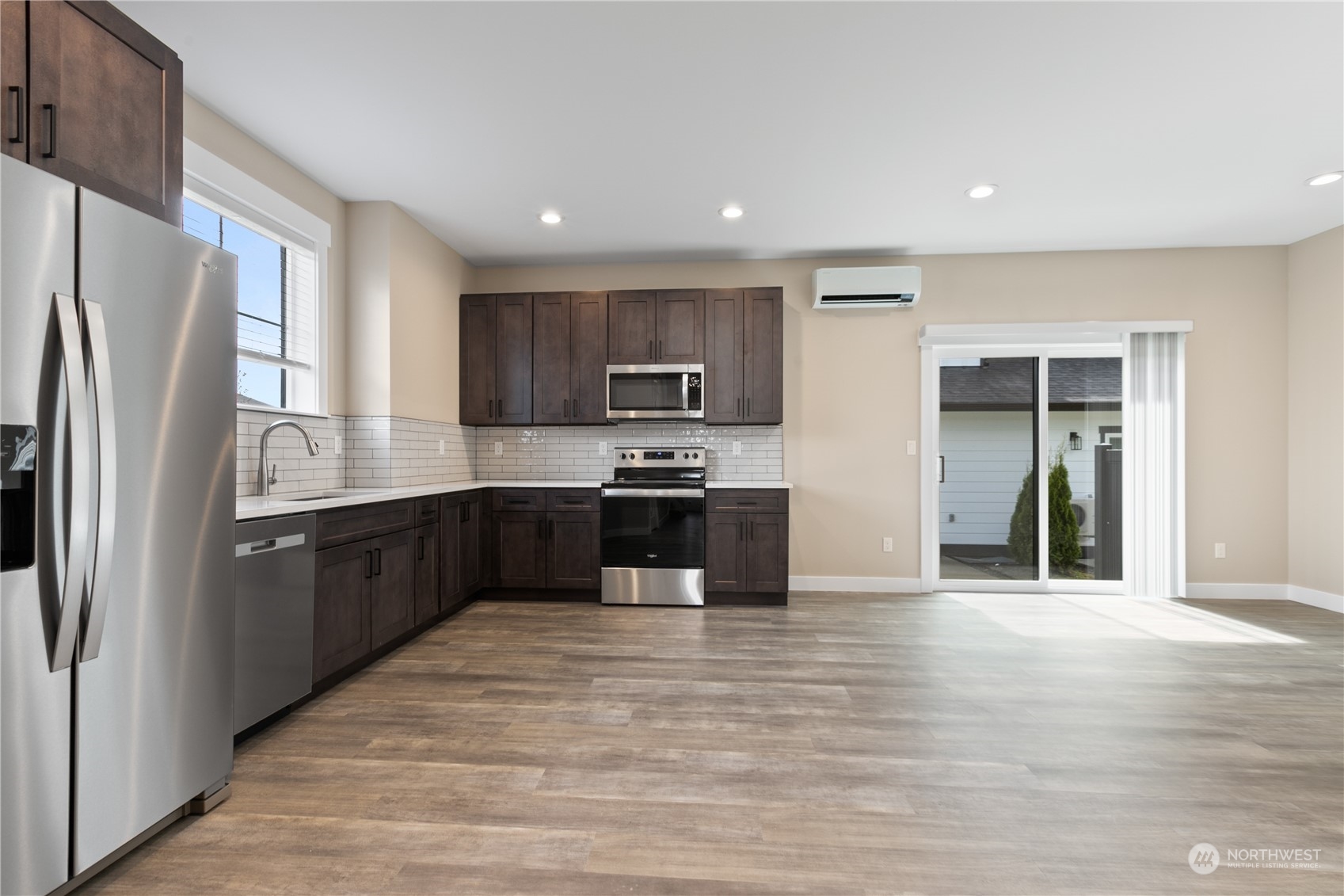2217 Dejong Drive Lynden, WA 98264 - Photo 15 of 28 a large kitchen with stainless steel appliances granite countertop a stove a sink and a refrigerator