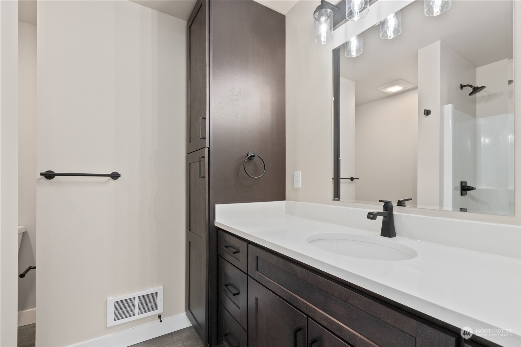 2217 Dejong Drive Lynden, WA 98264 - Photo 21 of 28 a bathroom with a sink and a mirror