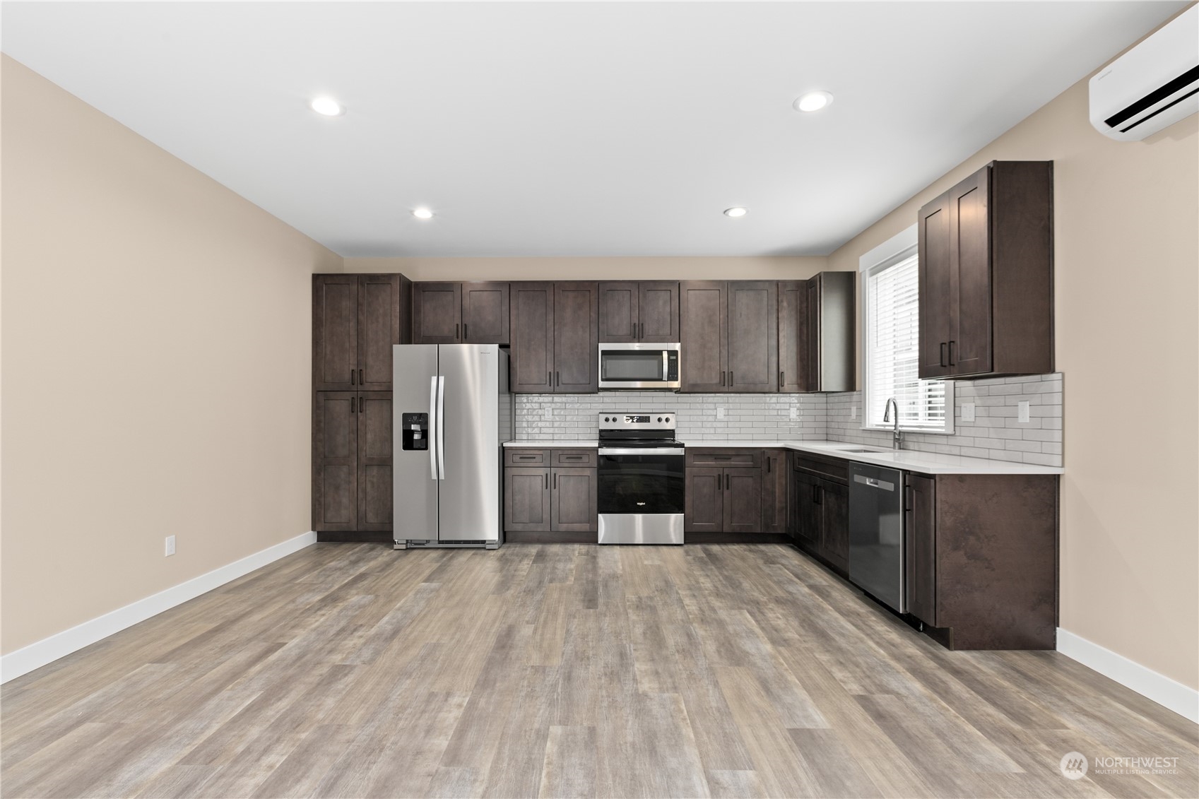 2217 Dejong Drive Lynden, WA 98264 - Photo 28 of 28 a kitchen with stainless steel appliances granite countertop a refrigerator a sink a stove a microwave and cabinets