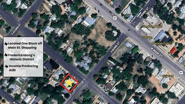 a view of a dining room with furniture wooden floor and chandelier