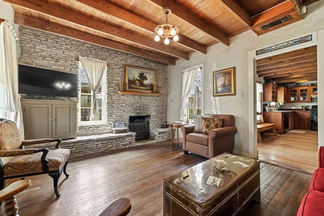 a kitchen with stainless steel appliances granite countertop a stove and a sink