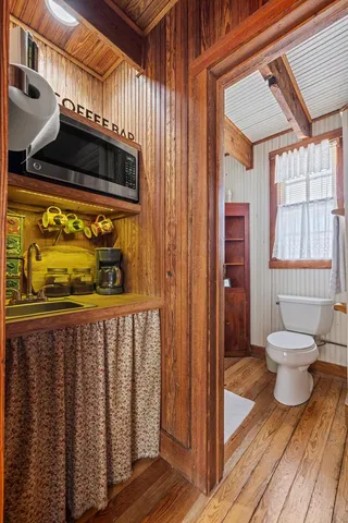 a bedroom with a bed and a closet