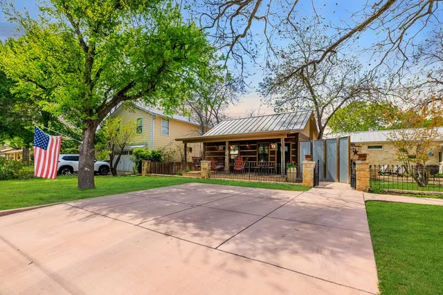 a view of an chairs and table in the balcony