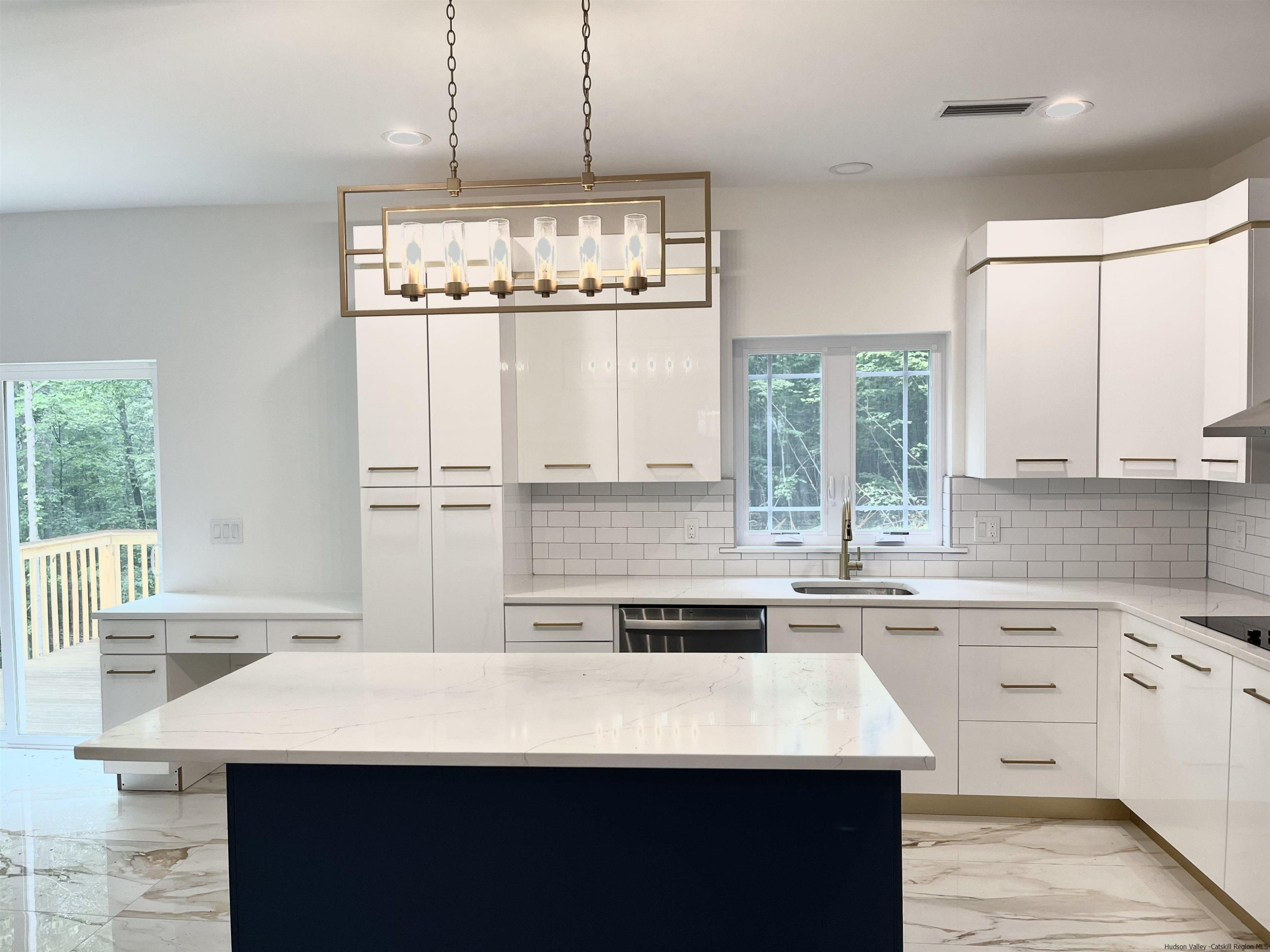 5 Calico Ways Ways, Unit WAYS Wallkill, NY 12589 - Photo 12 of 35 a kitchen with a sink window and cabinets