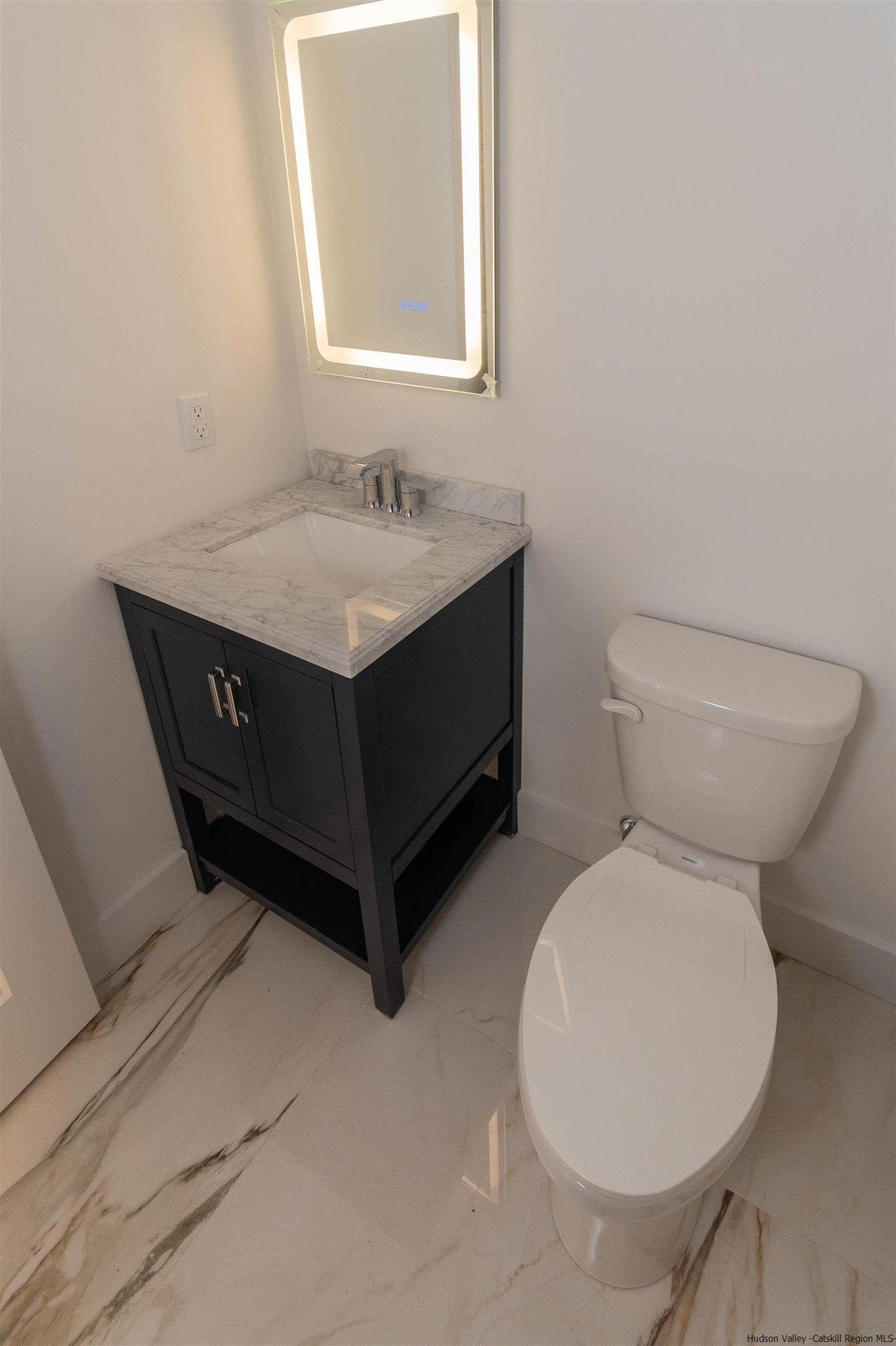 5 Calico Ways Ways, Unit WAYS Wallkill, NY 12589 - Photo 19 of 35 a bathroom with a toilet sink and mirror