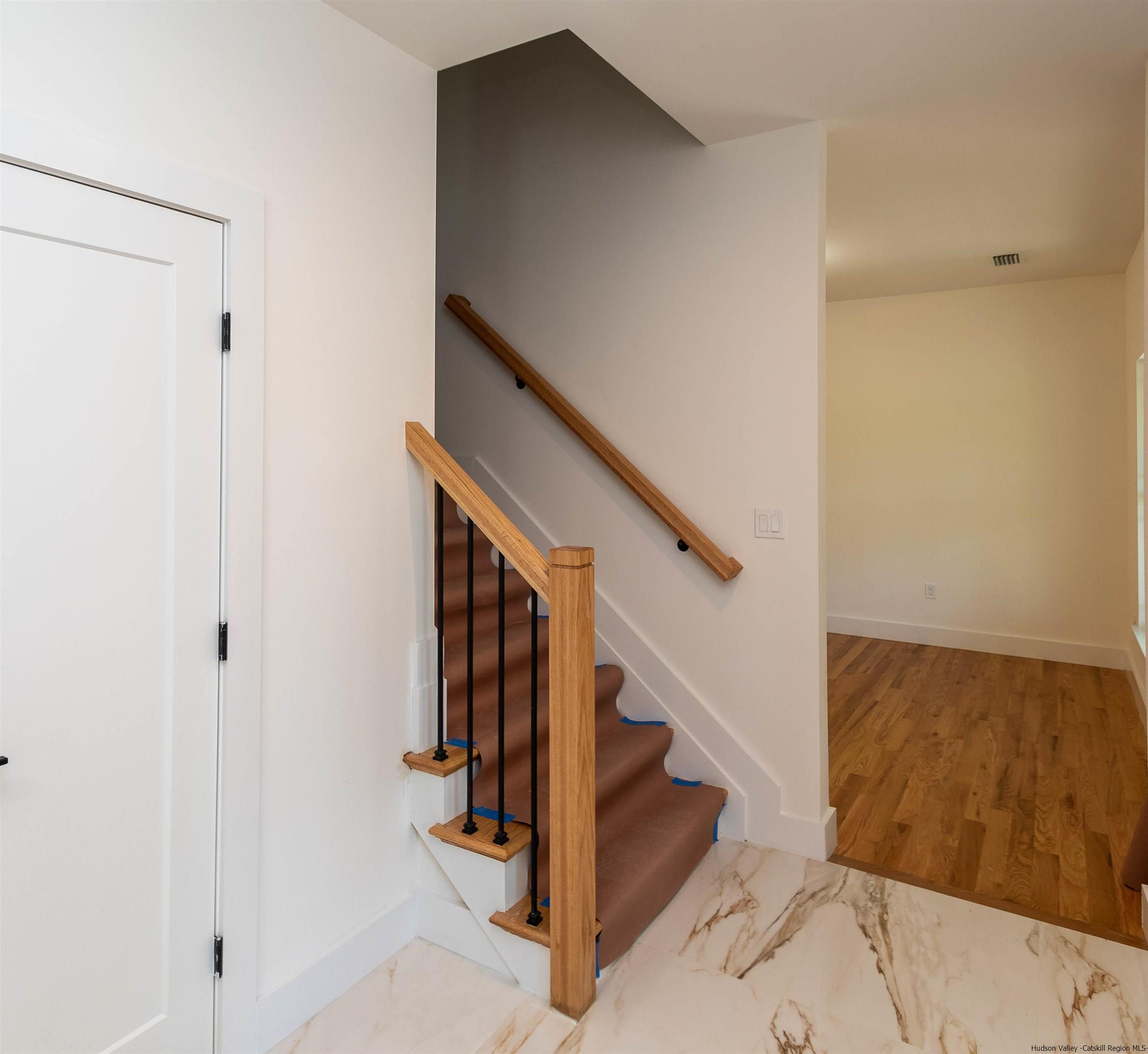 5 Calico Ways Ways, Unit WAYS Wallkill, NY 12589 - Photo 20 of 35 a view of entryway and hall with wooden floor
