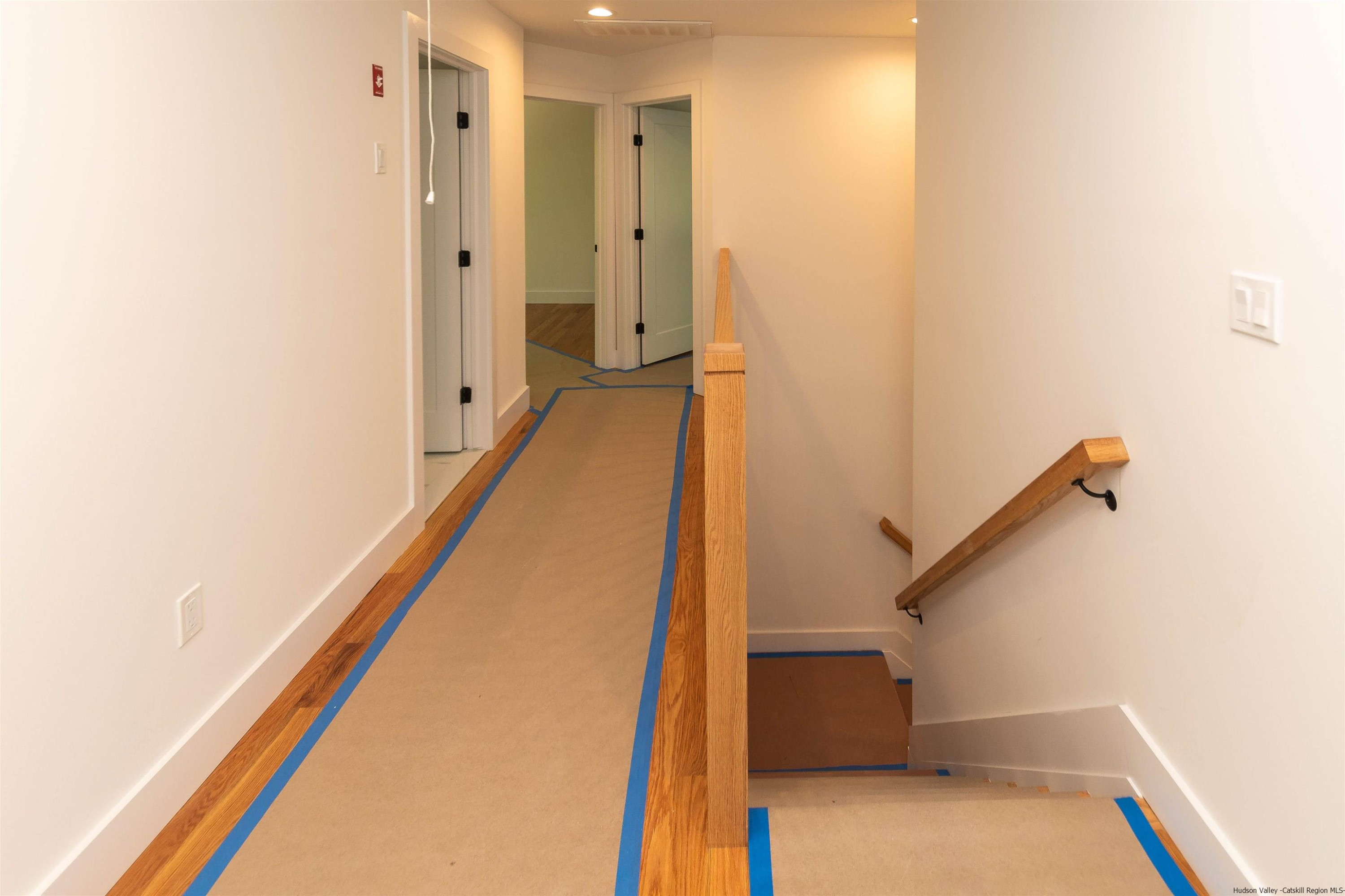 5 Calico Ways Ways, Unit WAYS Wallkill, NY 12589 - Photo 21 of 35 a view of hallway with stairs