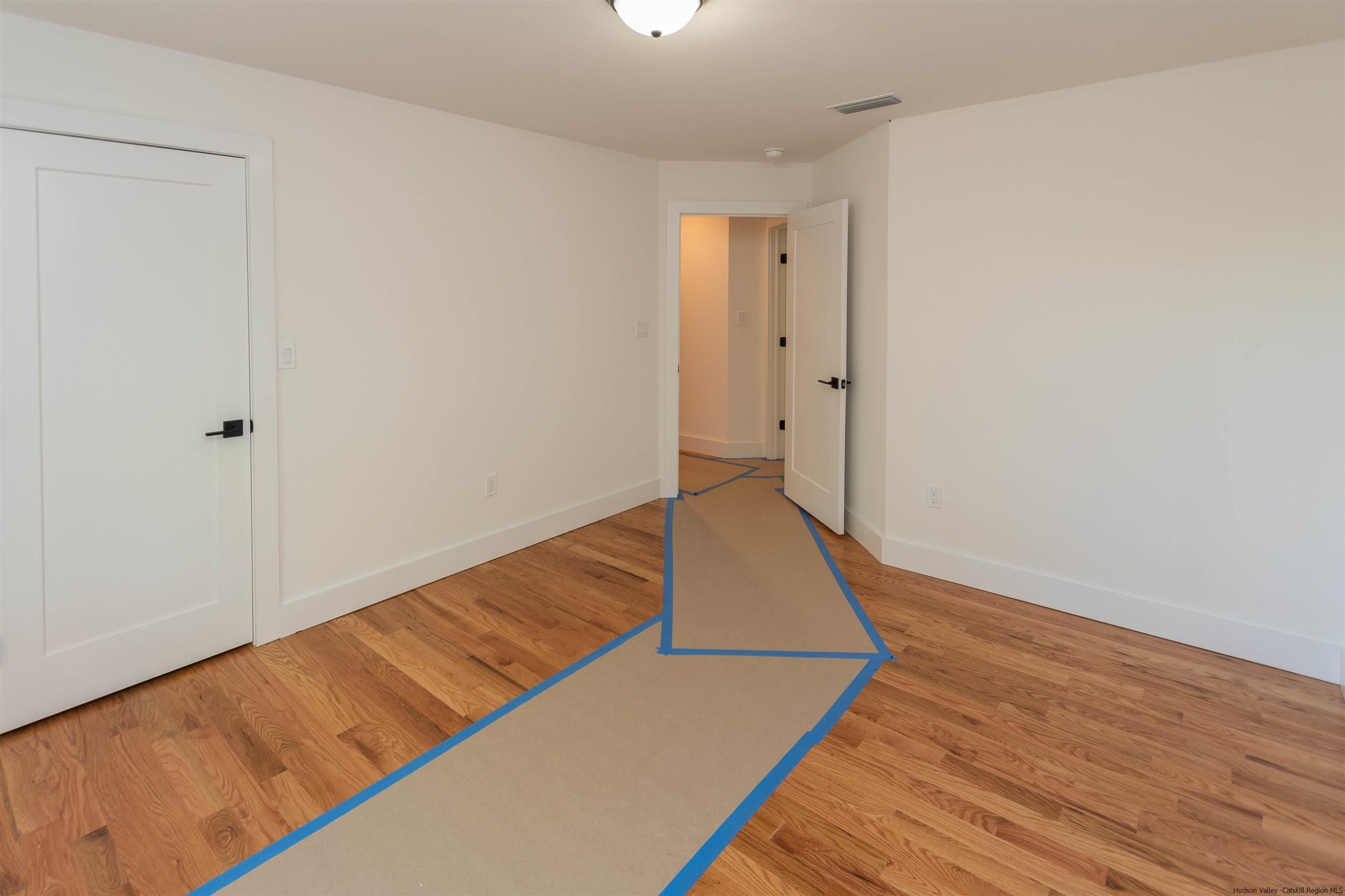 5 Calico Ways Ways, Unit WAYS Wallkill, NY 12589 - Photo 23 of 35 a view of a room with wooden floor