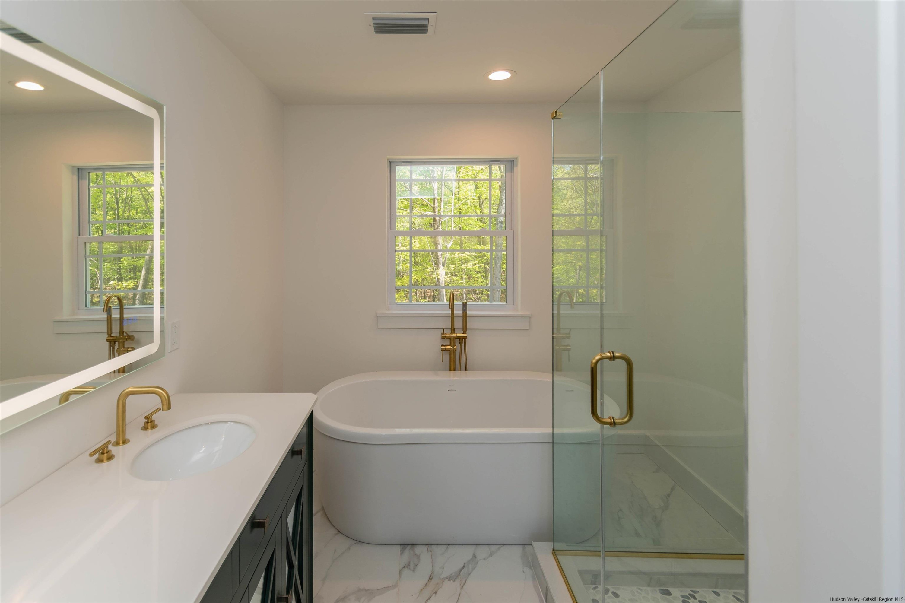 5 Calico Ways Ways, Unit WAYS Wallkill, NY 12589 - Photo 25 of 35 a bathroom with a sink a toilet and shower