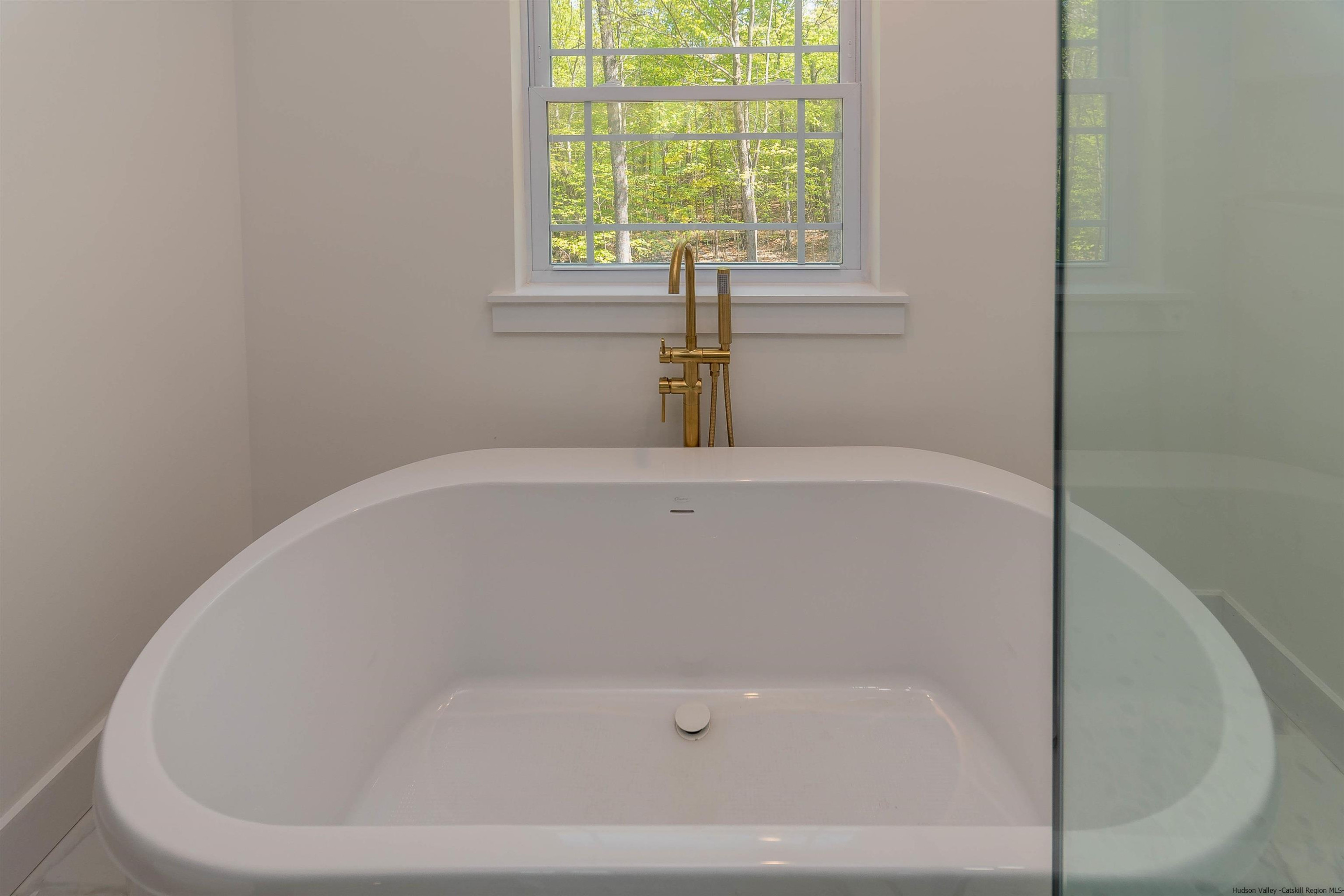 5 Calico Ways Ways, Unit WAYS Wallkill, NY 12589 - Photo 27 of 35 a close view of a bathtub in a bathroom
