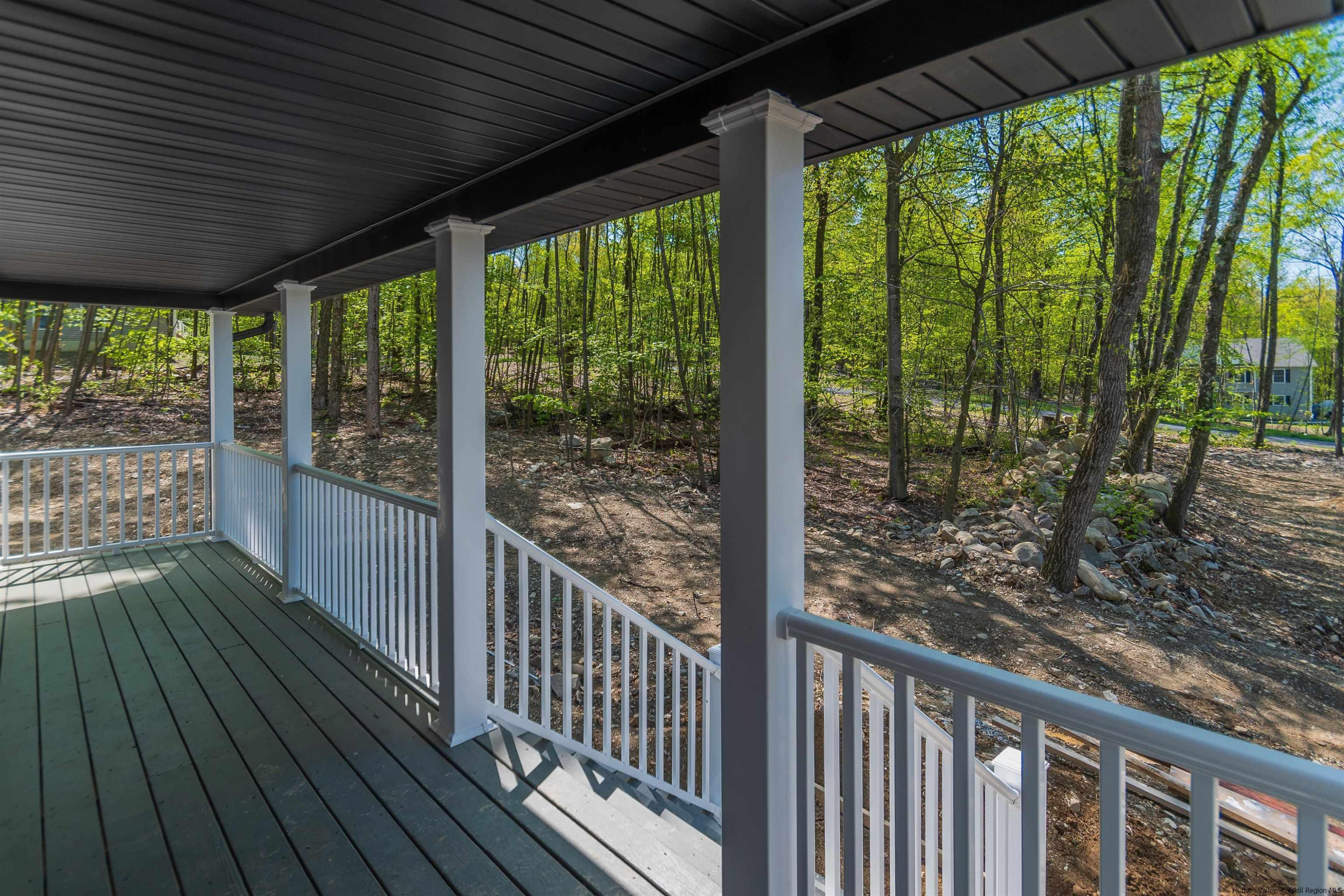 5 Calico Ways Ways, Unit WAYS Wallkill, NY 12589 - Photo 3 of 35 a view of a porch with wooden floor