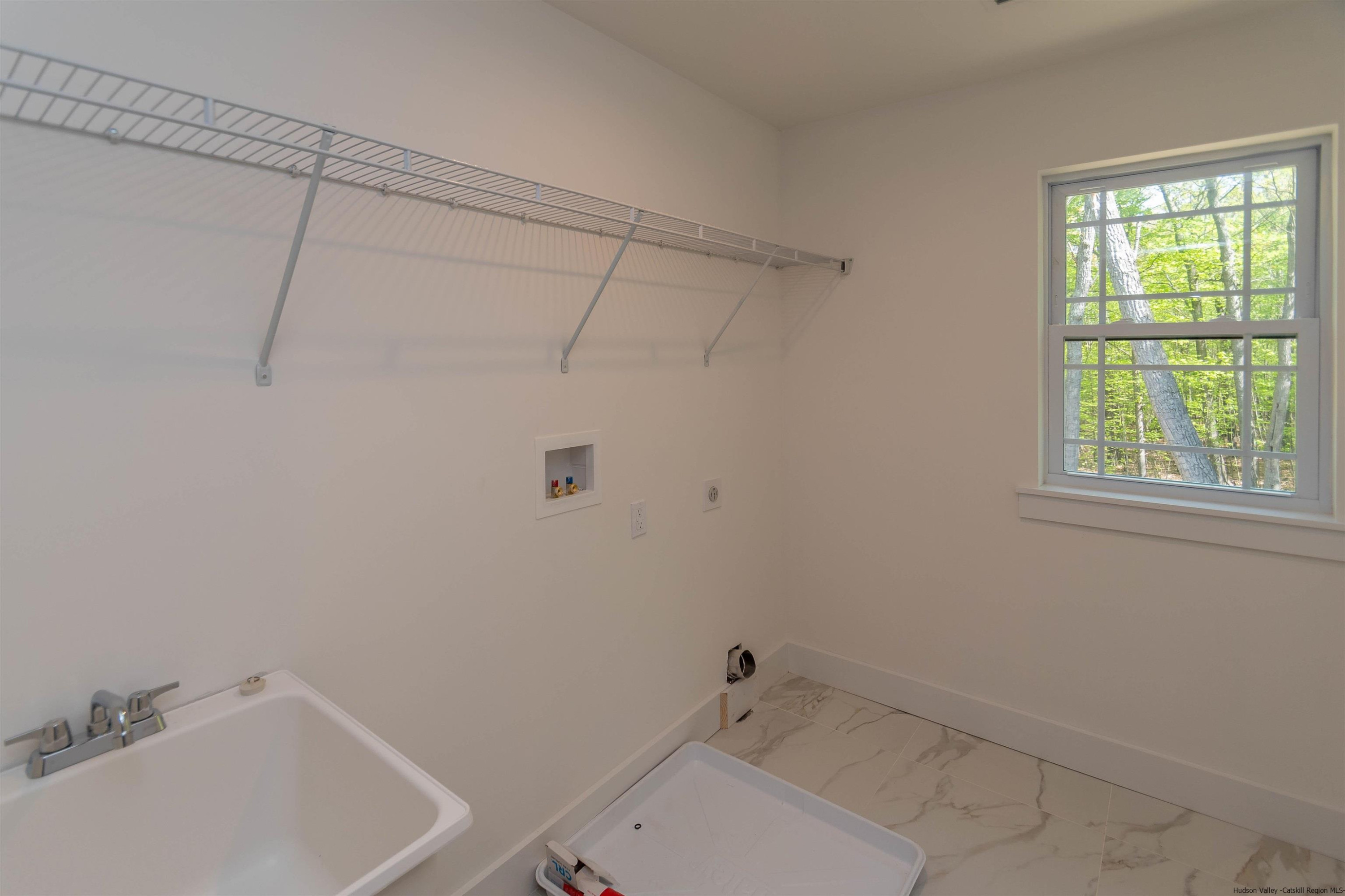 5 Calico Ways Ways, Unit WAYS Wallkill, NY 12589 - Photo 31 of 35 a bathroom with a sink and shower