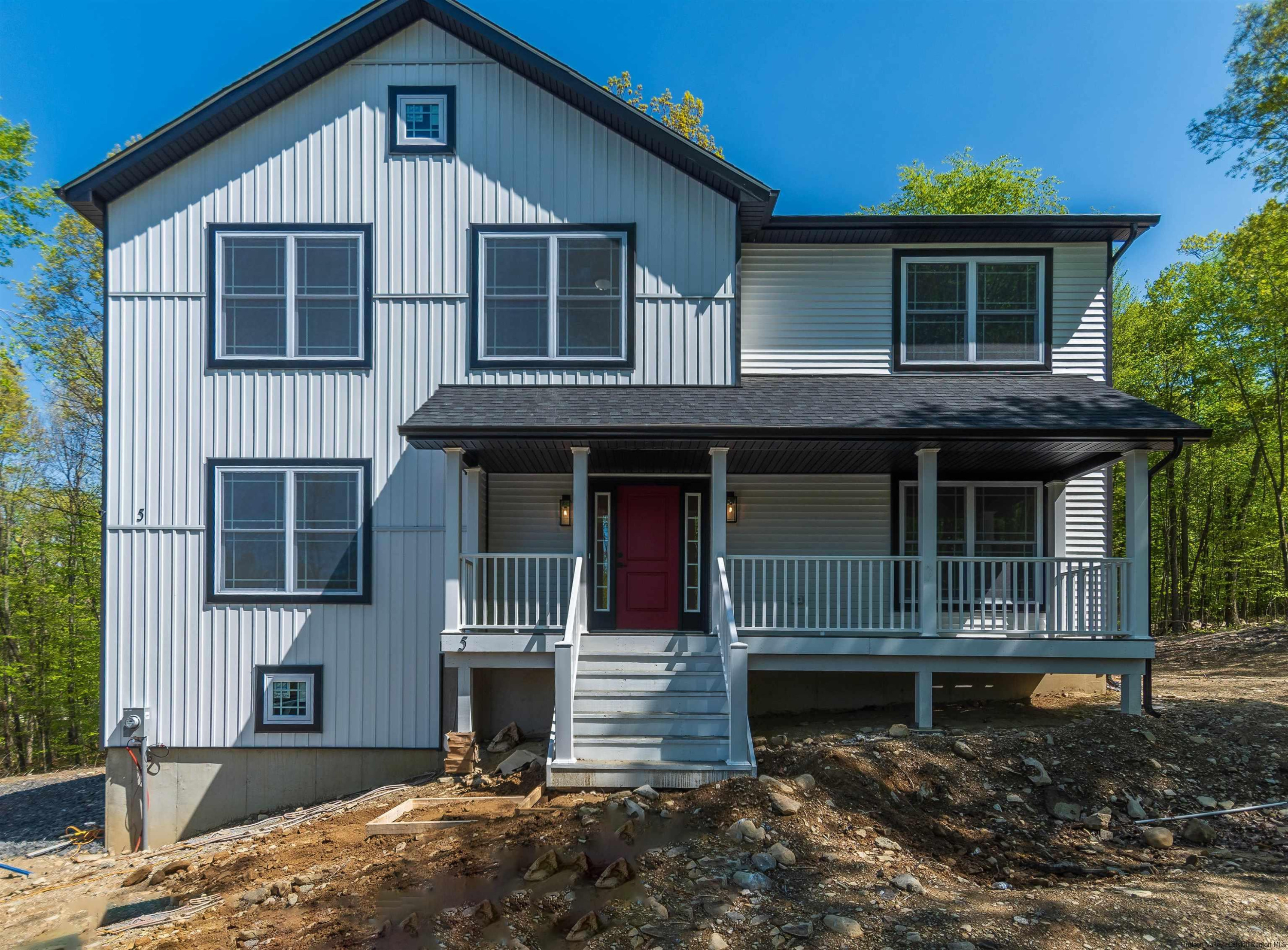 5 Calico Ways Ways, Unit WAYS Wallkill, NY 12589 - Photo 35 of 35 a front view of a house with a yard