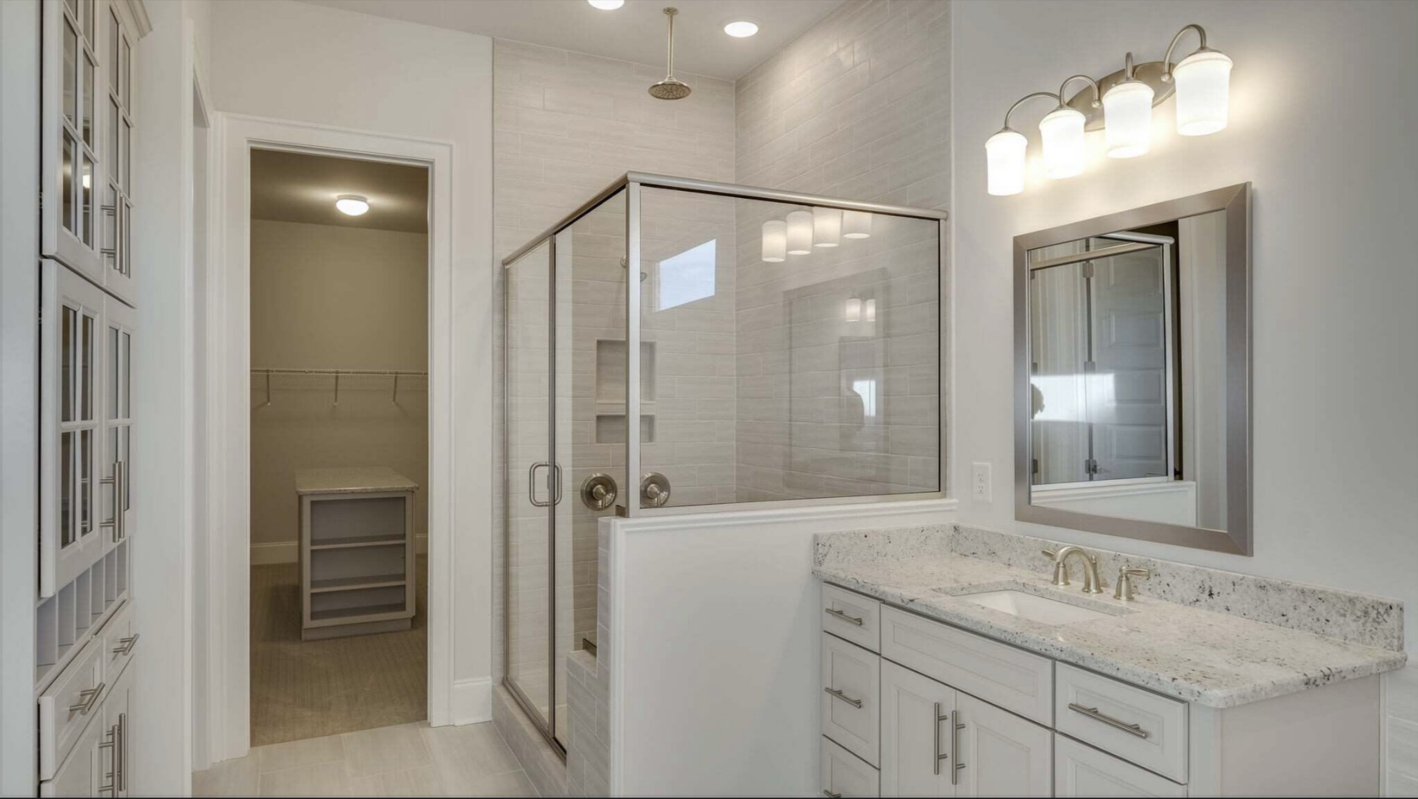 3203 Chase Point Drive Franklin, TN 37067 - Photo 20 of 30 a bathroom with a granite countertop sink mirror and shower