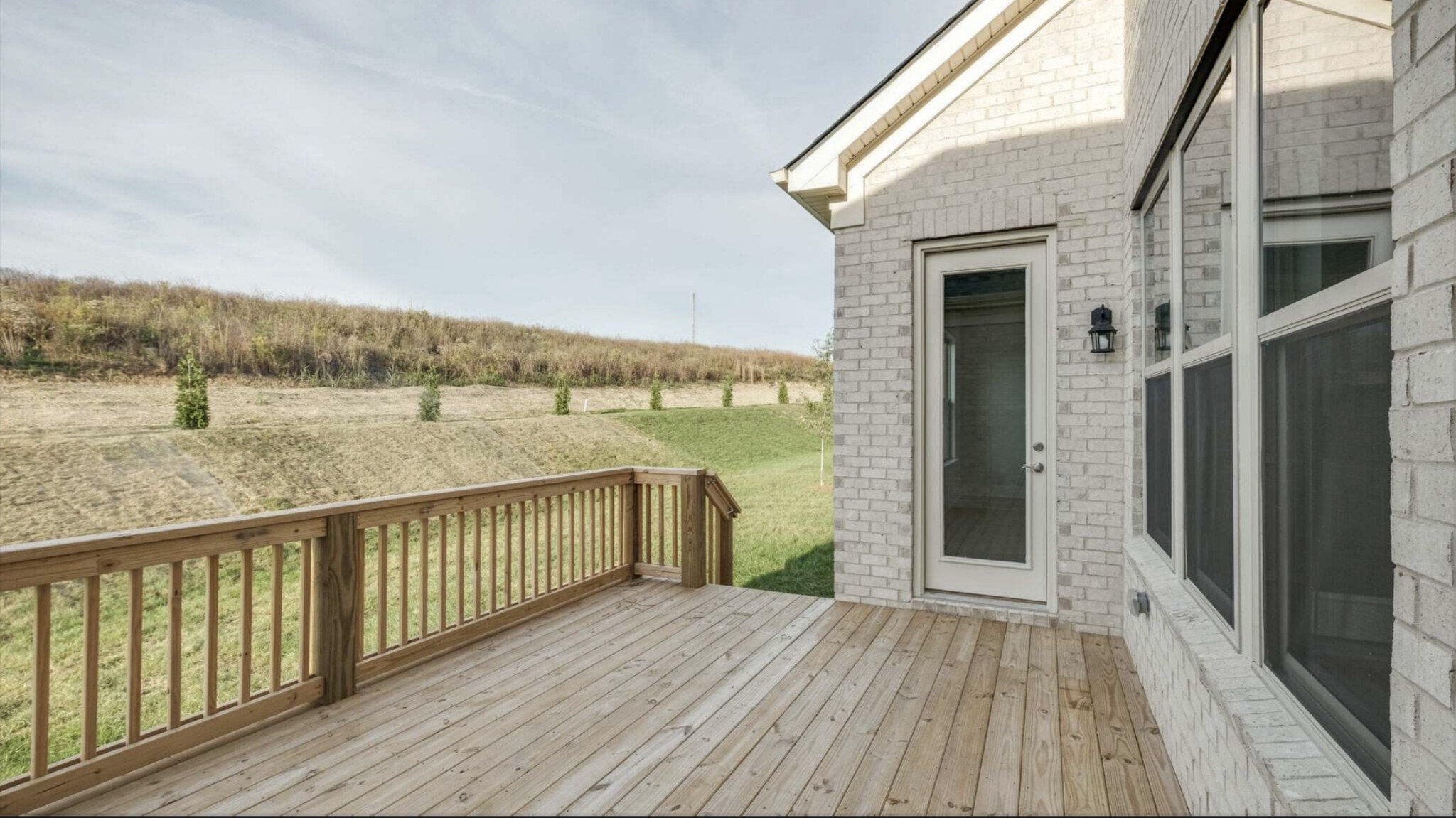 3203 Chase Point Drive Franklin, TN 37067 - Photo 26 of 30 a view of a balcony with wooden floor and fence