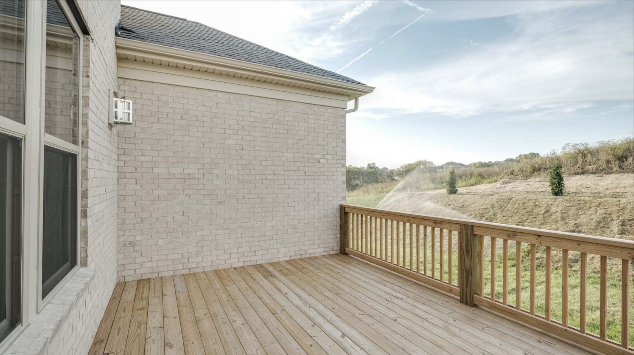 3203 Chase Point Drive Franklin, TN 37067 - Photo 28 of 30 a view of a balcony with wooden floor and fence