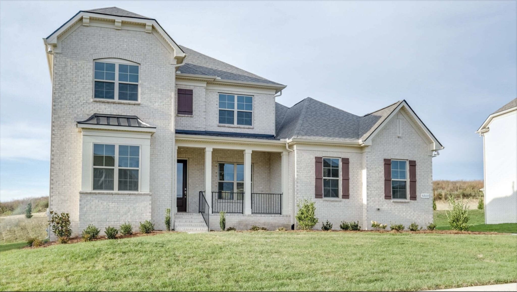 3203 Chase Point Drive Franklin, TN 37067 - Photo 3 of 30 a front view of a house with a yard