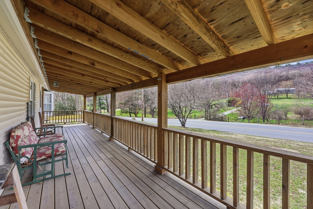 240 Upper Road Deerfield, MA 01342 - Photo 9 of 42 a view of balcony with wooden floor