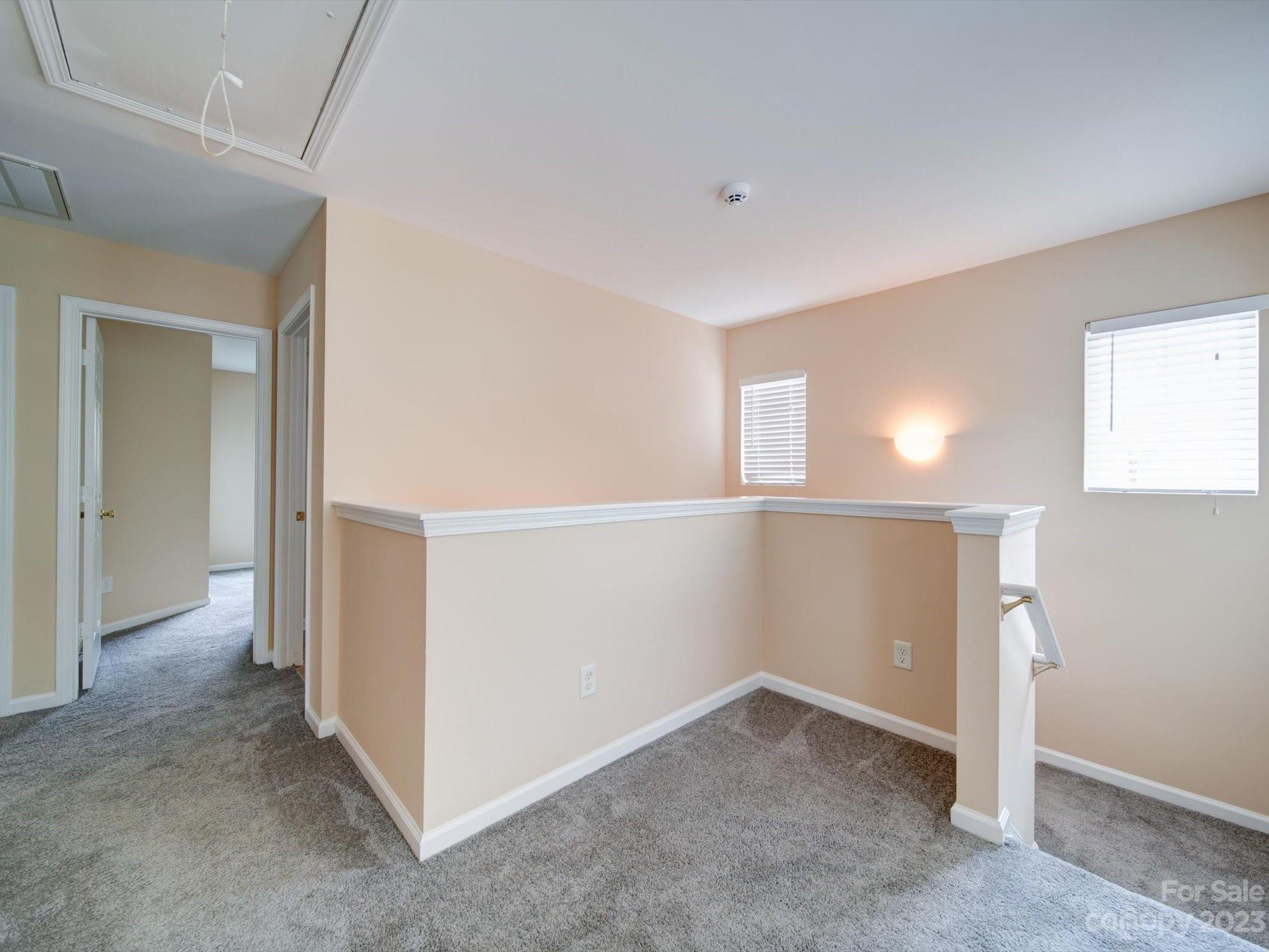 9221 Seamill Road Charlotte, NC 28278 - Photo 17 of 38 an empty room with windows