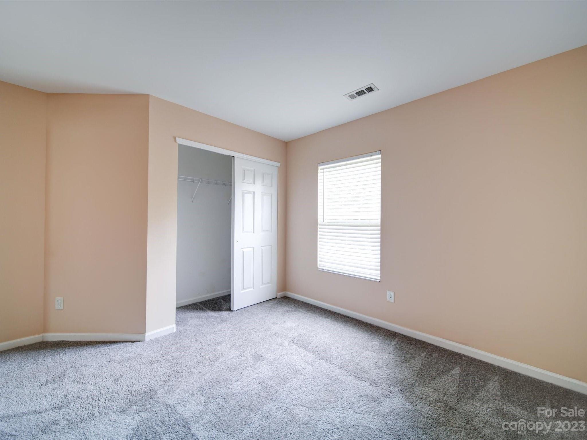 9221 Seamill Road Charlotte, NC 28278 - Photo 26 of 38 a view of an empty room with a window