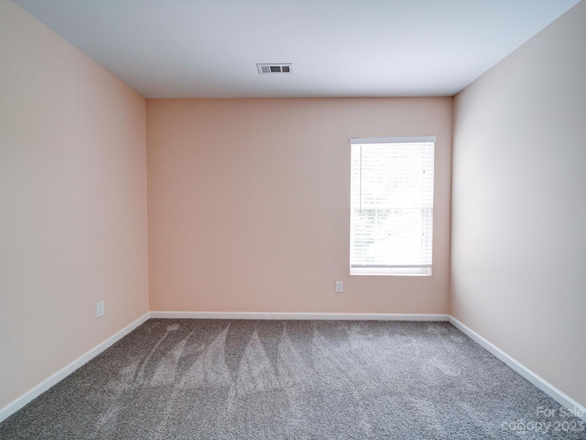 9221 Seamill Road Charlotte, NC 28278 - Photo 28 of 38 an empty room with a window