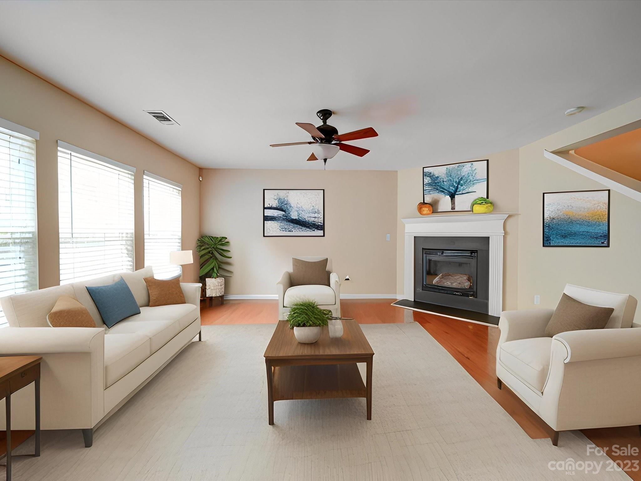 9221 Seamill Road Charlotte, NC 28278 - Photo 7 of 38 a living room with furniture and a fireplace