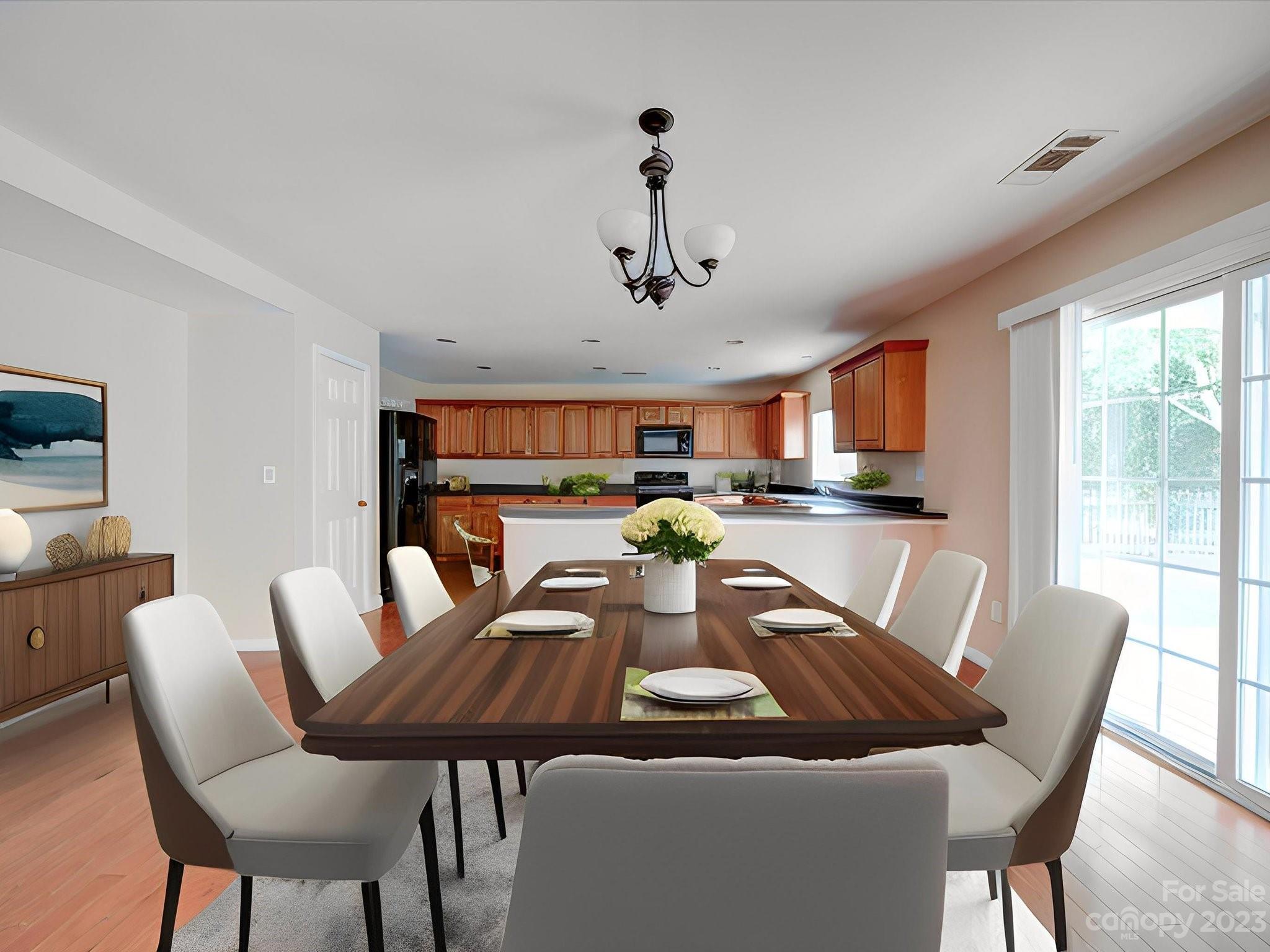 9221 Seamill Road Charlotte, NC 28278 - Photo 10 of 38 a view of a dining room with furniture window and outside view