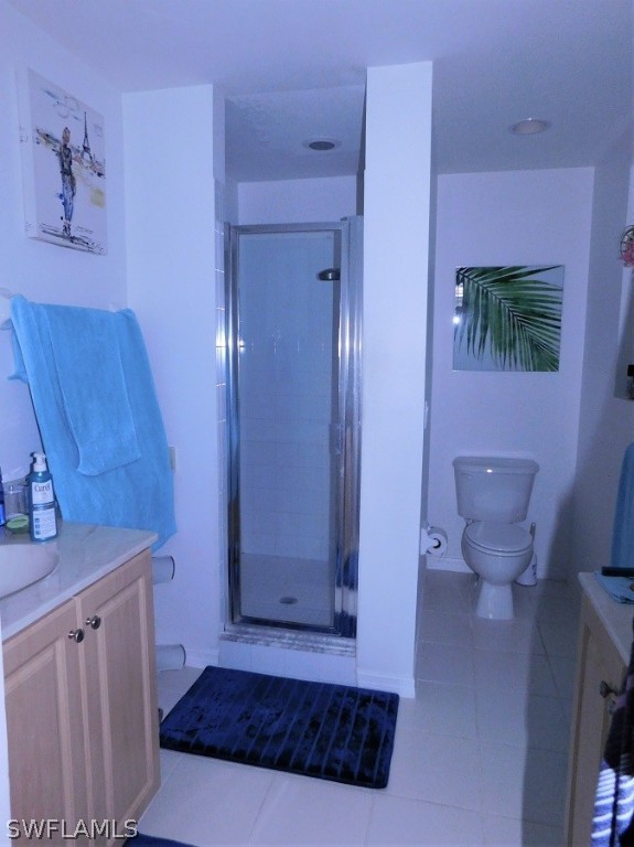 5180 Park Road, Unit 1 Fort Myers, FL 33908 - Photo 14 of 24 a spacious bathroom with a granite countertop sink a toilet and shower