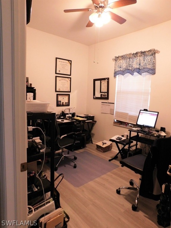 5180 Park Road, Unit 1 Fort Myers, FL 33908 - Photo 16 of 24 a view of a workspace with furniture and a window