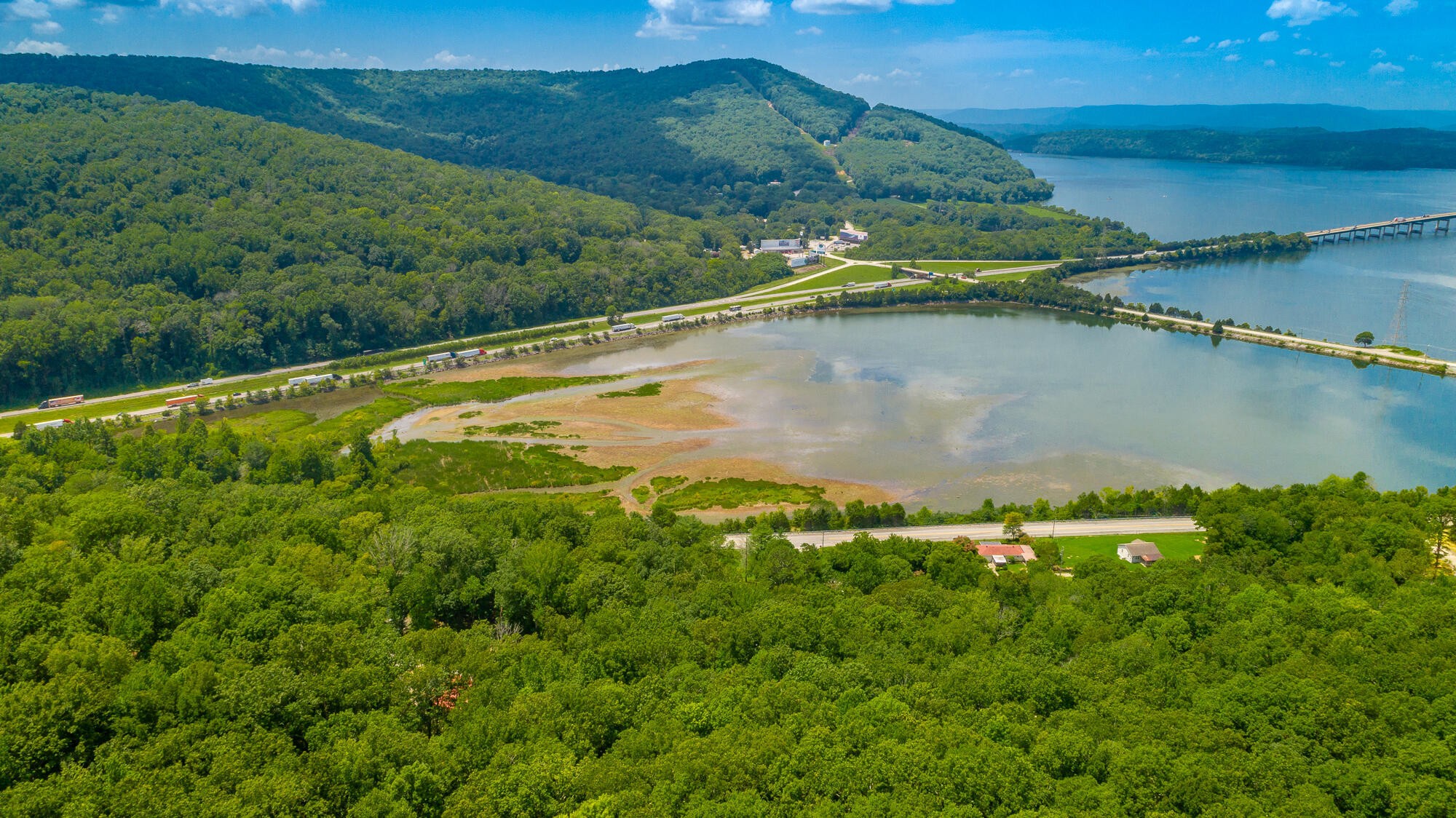 0 Highway 134 Guild, TN 37340 - Photo 26 of 68 a view of a water pond with green field