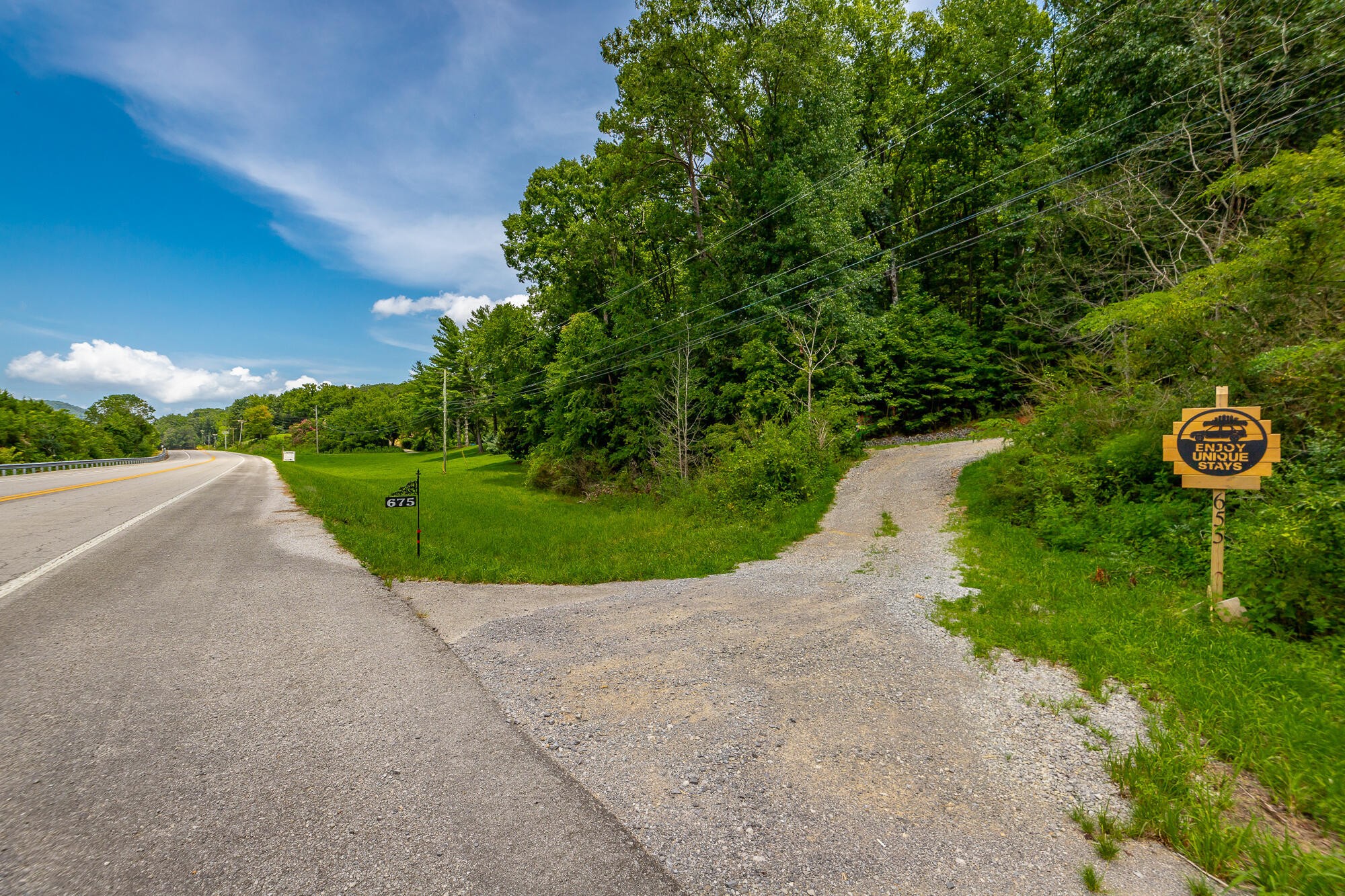 0 Highway 134 Guild, TN 37340 - Photo 32 of 68 a view of a garden with a building in the background