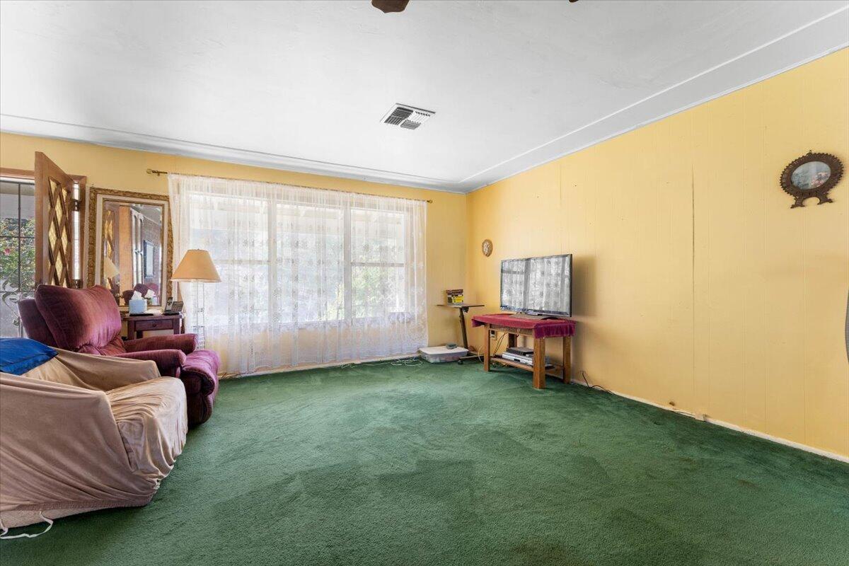 16483 Buzzard Roost Road Bella Vista, CA 96008 - Photo 134 of 138 a living room with furniture and a window