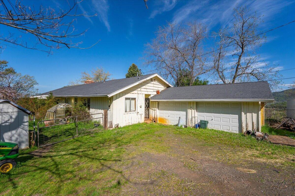 16483 Buzzard Roost Road Bella Vista, CA 96008 - Photo 31 of 138 a house view with a garden space