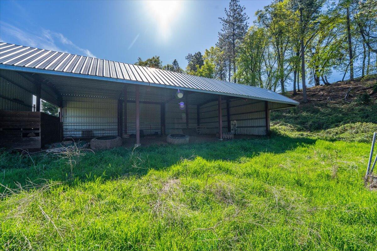 16483 Buzzard Roost Road Bella Vista, CA 96008 - Photo 43 of 138 a view of a house with a back yard
