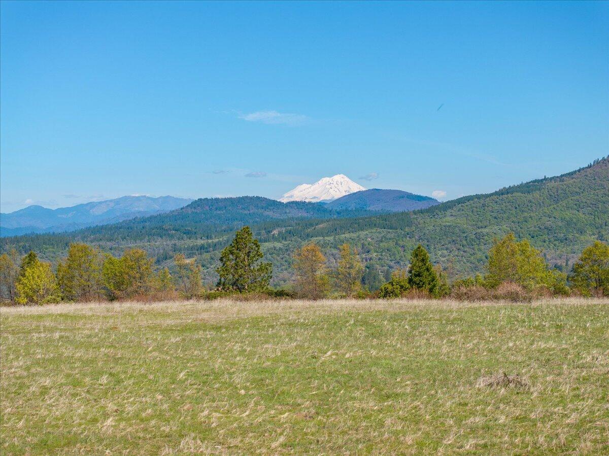 16483 Buzzard Roost Road Bella Vista, CA 96008 - Photo 52 of 138 a view of lake with mountain in the background