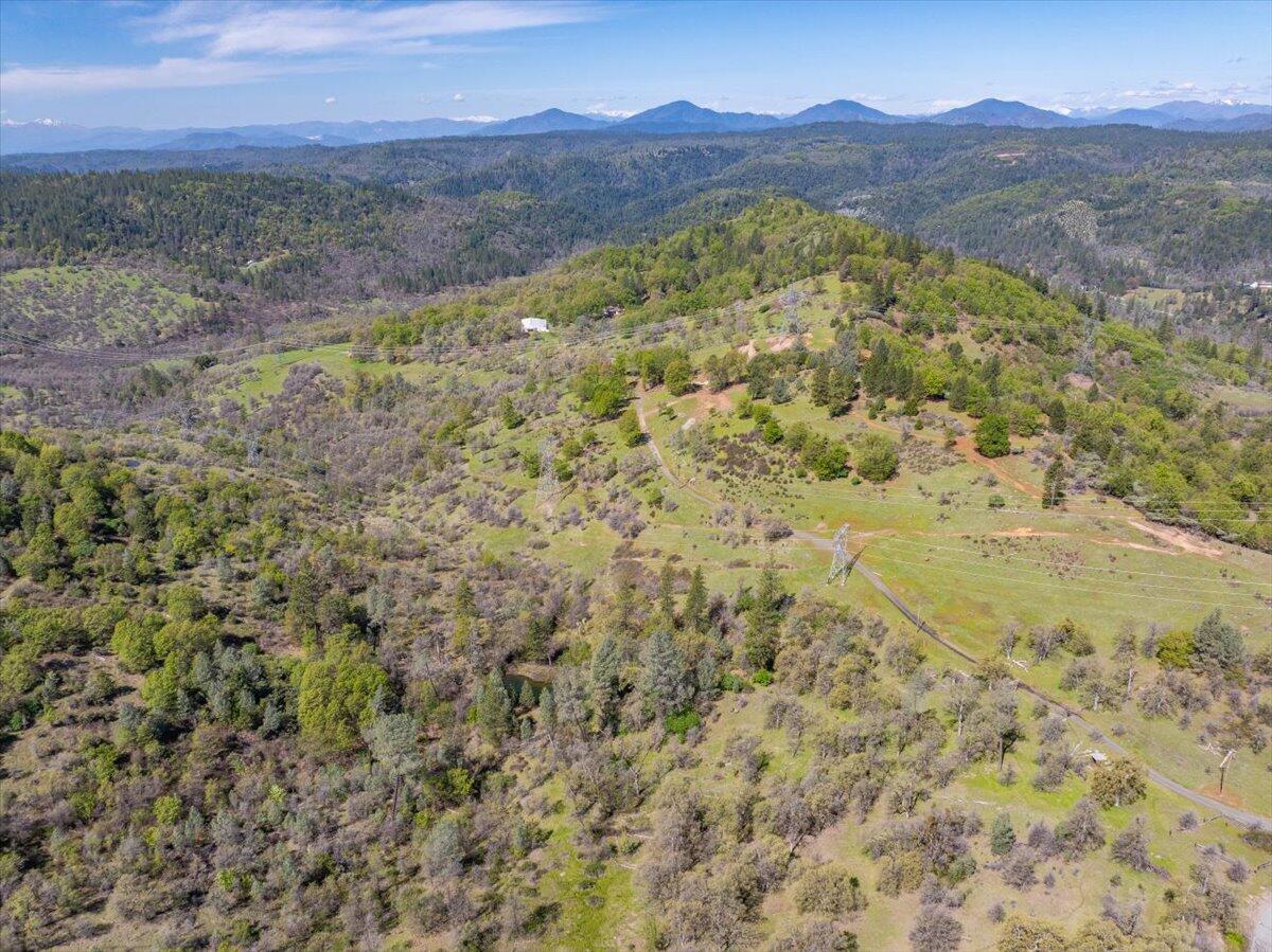 16483 Buzzard Roost Road Bella Vista, CA 96008 - Photo 96 of 138 a view of an outdoor space and mountain view