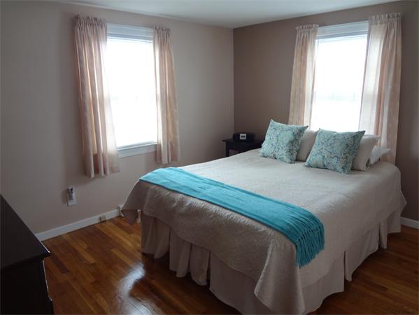 16 Brae Road Weymouth, MA 02191 - Photo 11 of 22 a bedroom with a bed and window