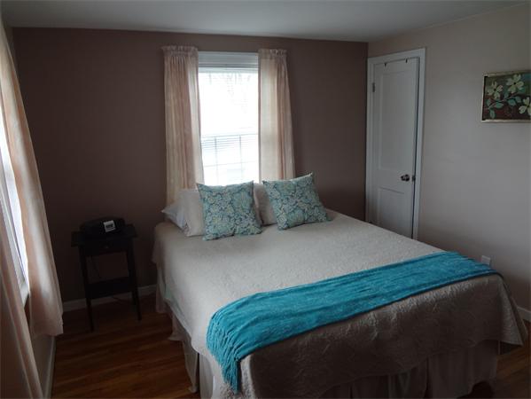 16 Brae Road Weymouth, MA 02191 - Photo 12 of 22 a bedroom with a bed and a window