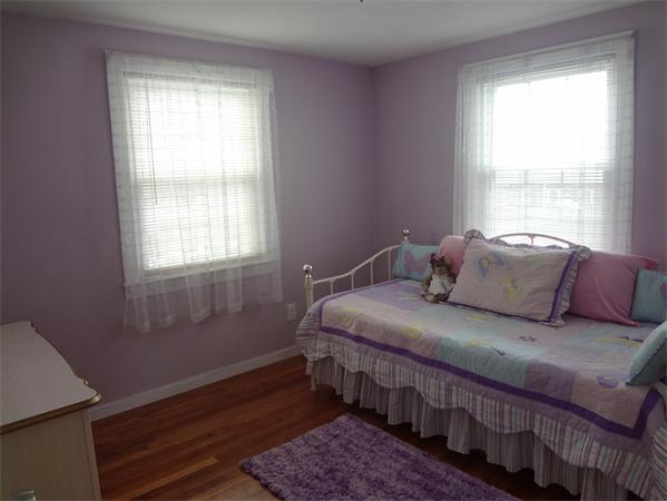 16 Brae Road Weymouth, MA 02191 - Photo 13 of 22 a bedroom with a bed window and wooden floor