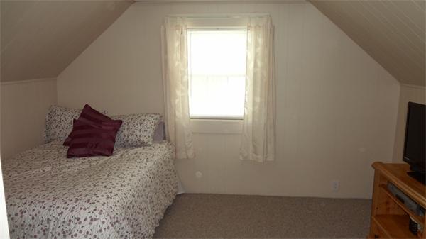 16 Brae Road Weymouth, MA 02191 - Photo 15 of 22 a room with a bed and a television