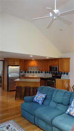 16 Brae Road Weymouth, MA 02191 - Photo 7 of 22 a living room with furniture and a kitchen view