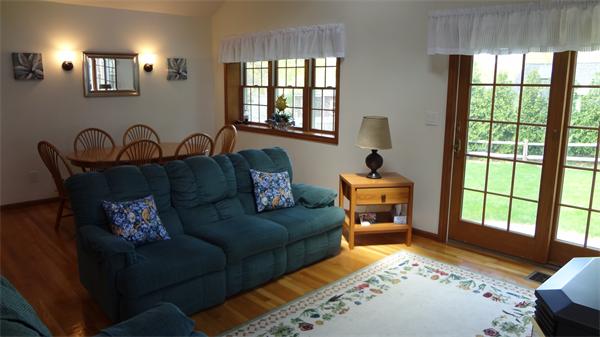 16 Brae Road Weymouth, MA 02191 - Photo 8 of 22 a living room with furniture and floor to ceiling windows
